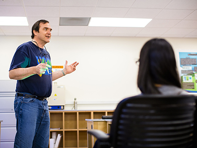 Professor Christopher Viney teaching students