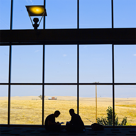 Students study inside the Social Sciences and Management Building