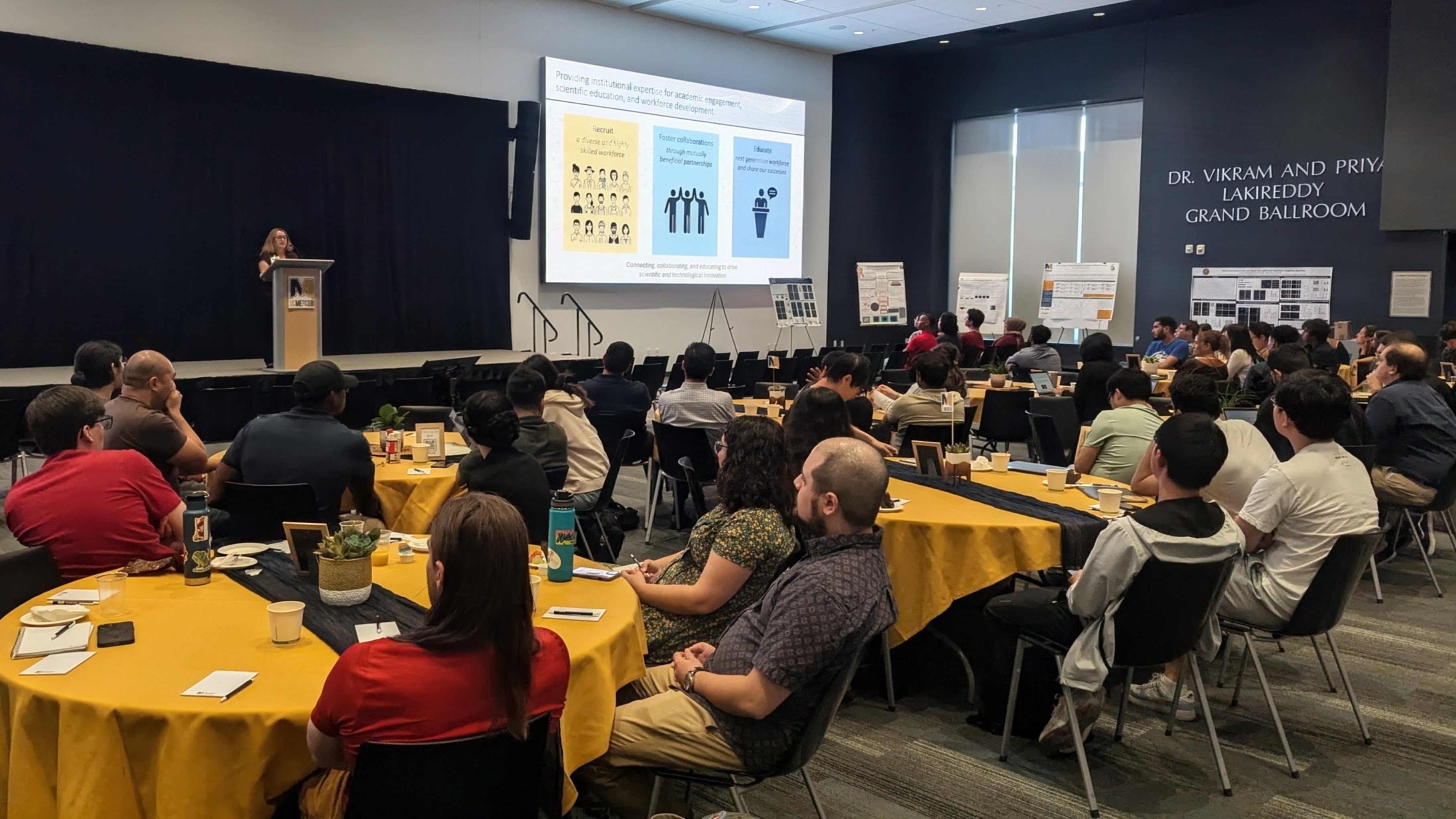 UC Merced National Labs Day audience and speaker at podium