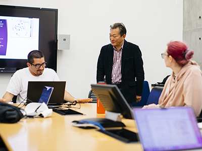 Professor Chris Amemiya and graduate students