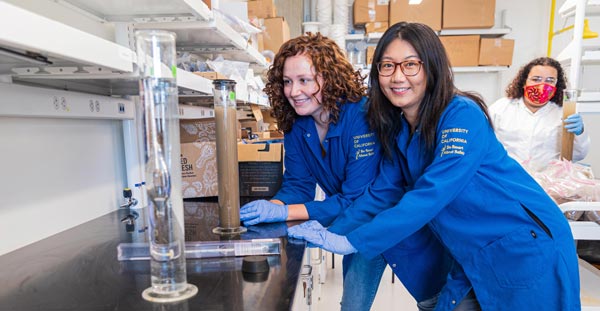 post doctorate students in the lab running an experiment