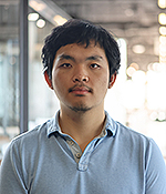 male wearing a light blue button up shirt