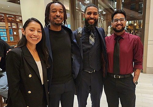 Group of emeriti student- regents and current student-regent standing