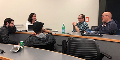Professors Mike Colvin and Arnold Kim speak with NRT-ICGE students. 